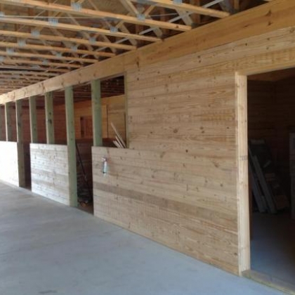 Nearly complete stalls with pine to grove finish